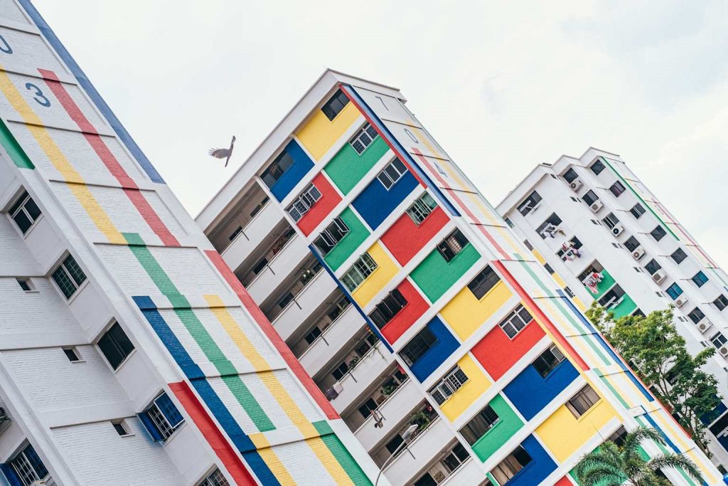 Singapore HDB apartment buildings with colorful designs.